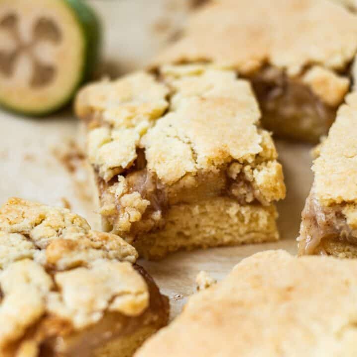 a close up of feijoa shortcake with a brown crackly crumble topping