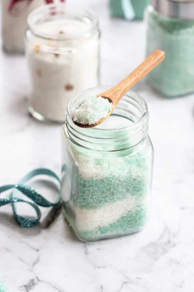 a jar of bath salt with a spoon