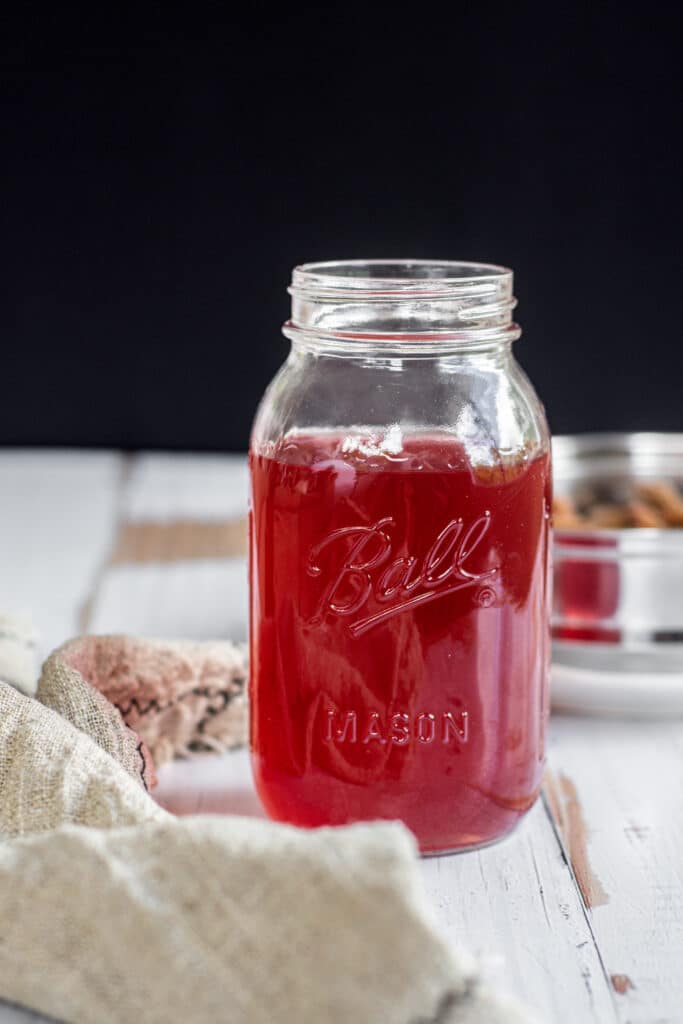 pink liquid in a mason jar