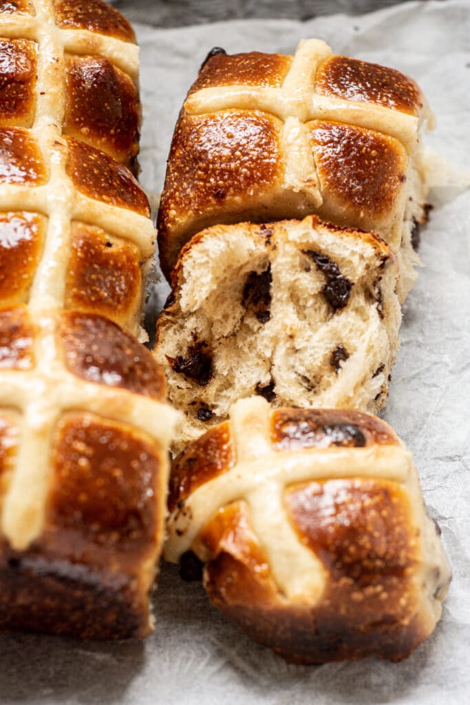 ripped in half sourdough hot cross buns with chocolate chips